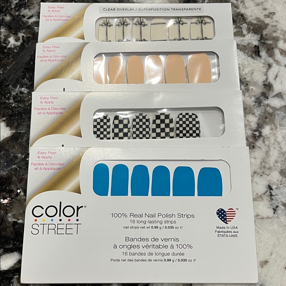 Color Street Nail Strips in Blue, Black, and Tan